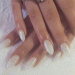 matte-white-almond-nails-with-glitter-1